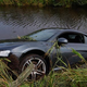 Illustration for article titled Audi R8 Jumps Into Roadside Canal, Cant Swim